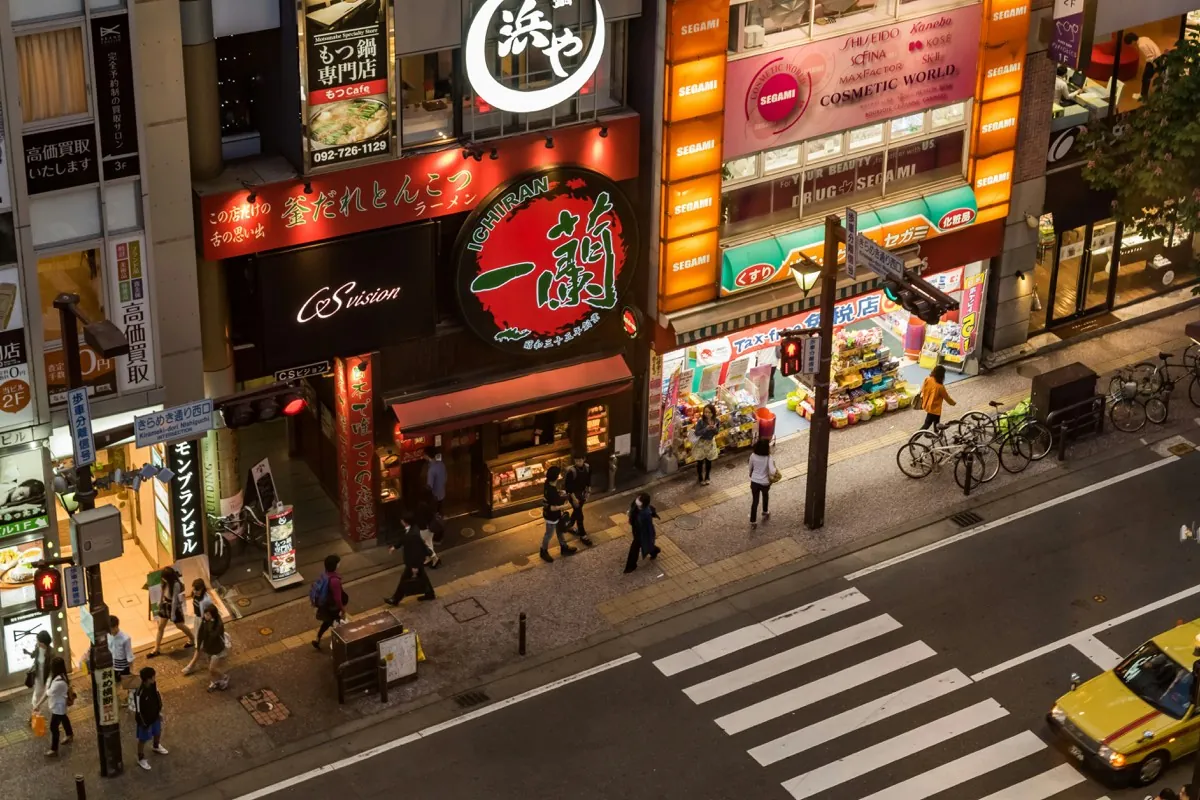 Illuminated Ichiran ramen branch on a Fukuoka street
