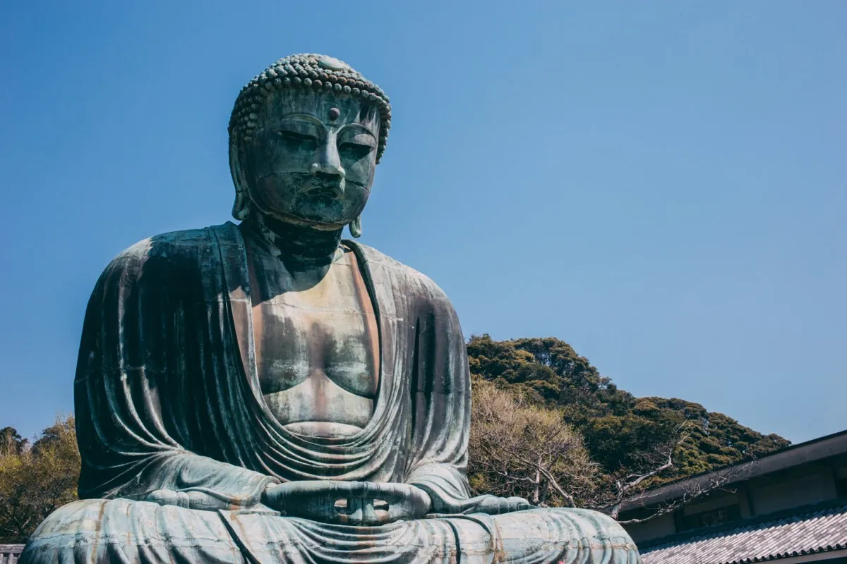 Bronze Great Buddha of Kotoku-in in Kamakura among the trees