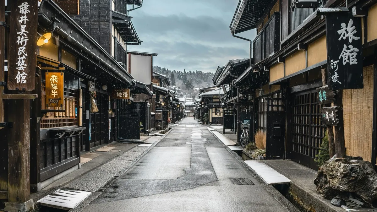 Historic wooden houses on the Sanmachi Suji street of Takayama under the snow